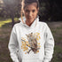 This hoodie features a beautifully detailed owl perched on a branch, surrounded by a scattering of warm-toned autumn leaves.